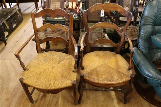 Two 19th century French rustic elbow chairs,
